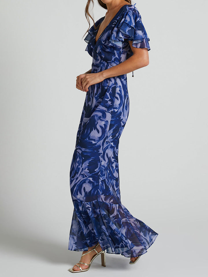 Mirelle - V Neck Flutter Sleeve Maxi Dress In Navy Swirl